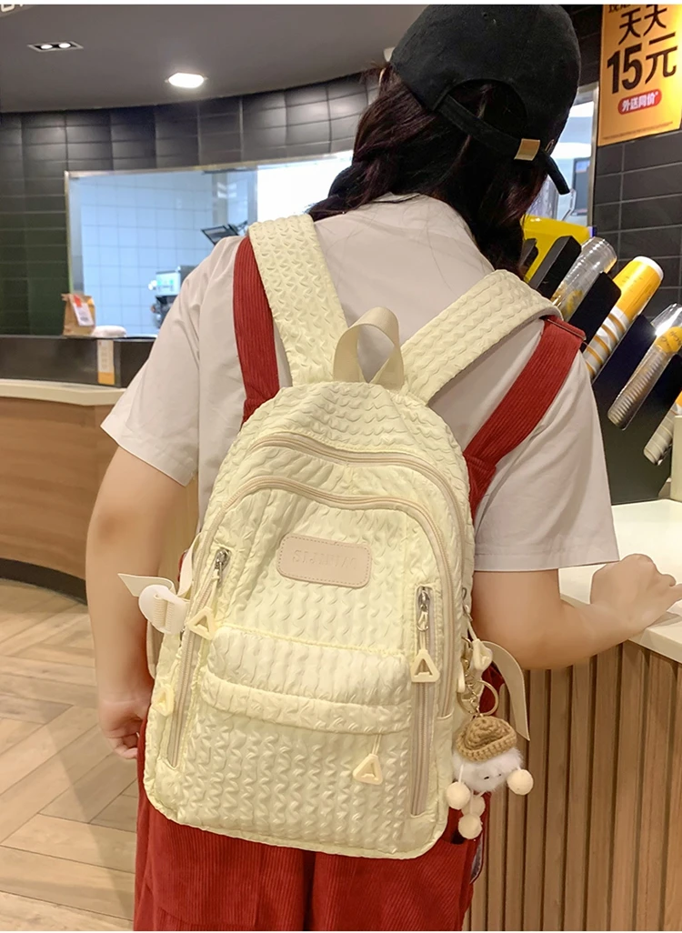 Highend pleated backpack for women 2025 new style simple student schoolbag large capacity commuting and travel bag