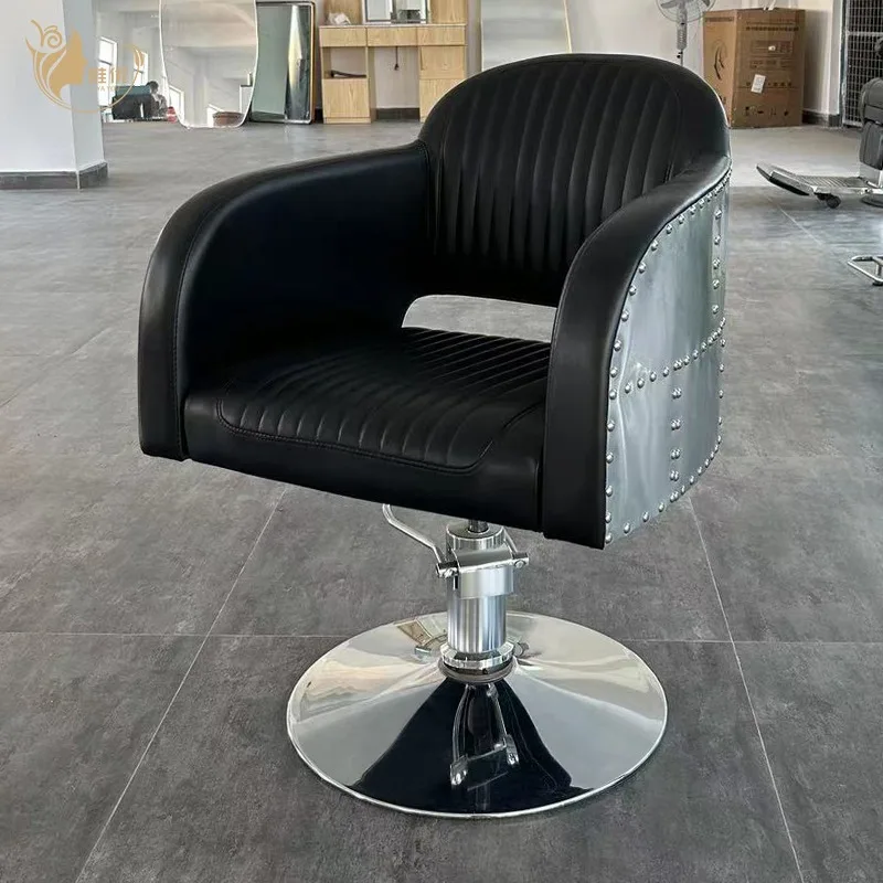 

Industrial-Style Black Leather Barber Chair with Riveted Metal Sides and Hydraulic Base