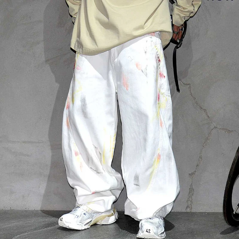 

vibe a niche men's streetwear brand featuring dirty and aged wide-leg white jeans from the Ba family deconstructs floor-length