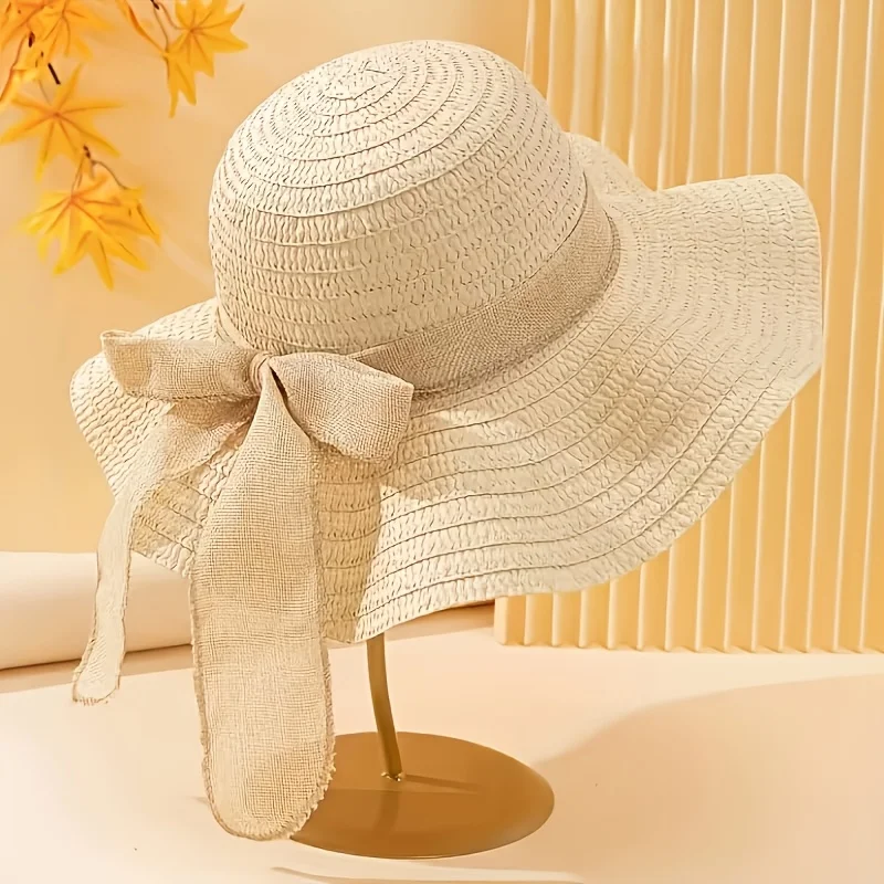 Elegant Wavy Brim Striped Bow Straw Hat