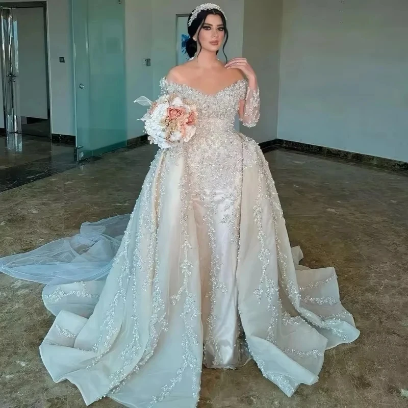 

2025 Modern Champagen Wedding Dress Off the Shoulder Heavy Appliques Pearls Princess Church Bridal Gowns Vestido De Noiva