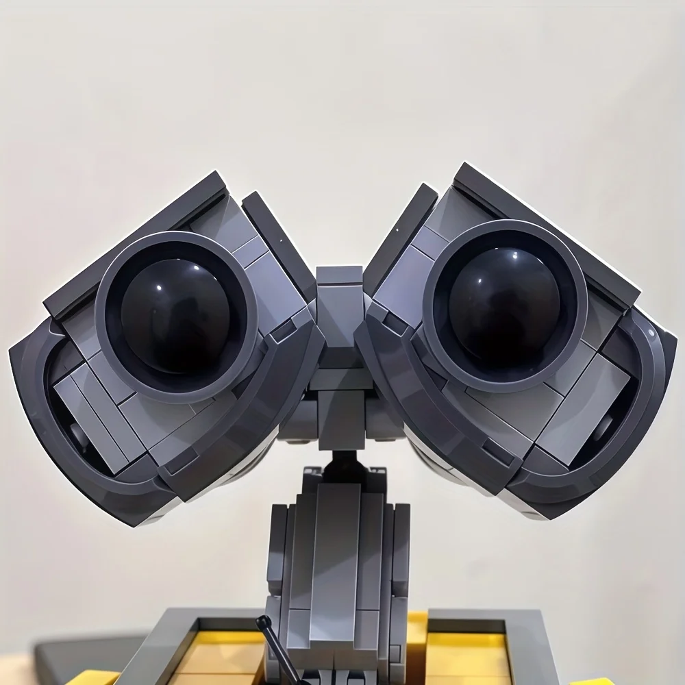 

The Yellow Big-Eyed Robot from the Movie 21303 Is Compatible with Major Brands, Making It an Ideal Choice for Halloween Gifts/Christmas Gifts/Easter Gifts/Thanksgiving Gifts/Birthday Gifts/Movie Enthusiasts, and a Perfect Home Decoration Item