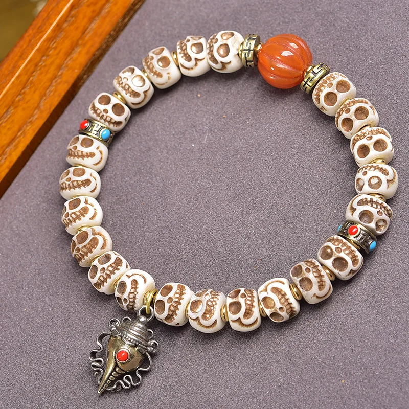 Tibetan- camel bone carved 