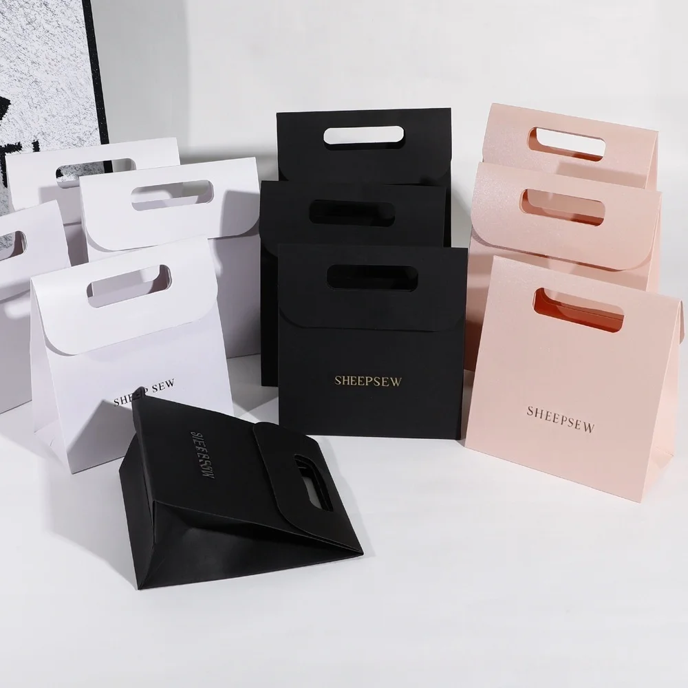 

50/100Pcs 14.5x15.5x7.5cm Jewelry Tote Bag Paper Wedding Favors Paper Bowknot Handle Pouch Personalized Logo Cosmetic Organizer