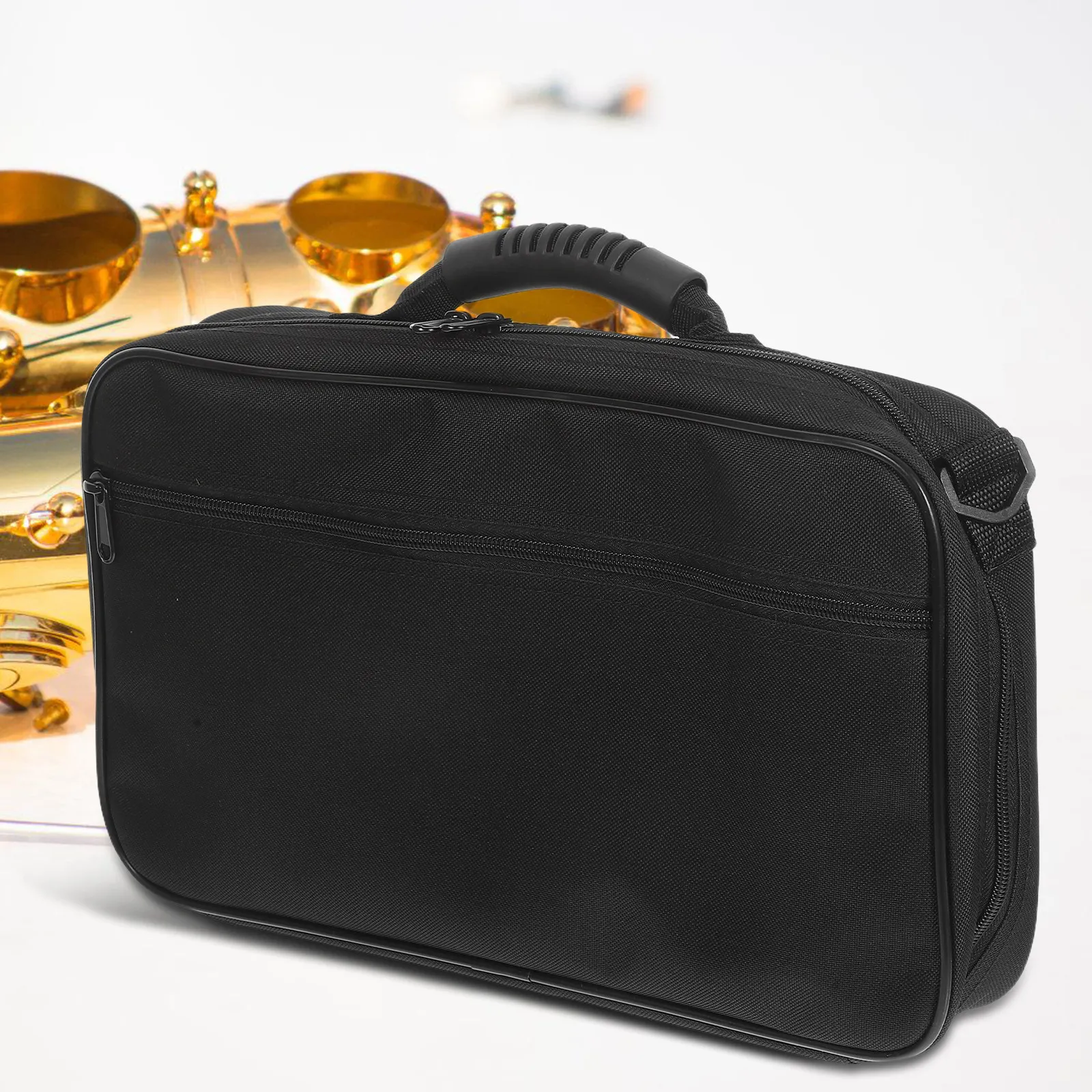 

Reliable Clarinet Carrying Case Built with Tough Black Oxford Cloth Waterproof Coating Shockproof Cushioning Portable Design