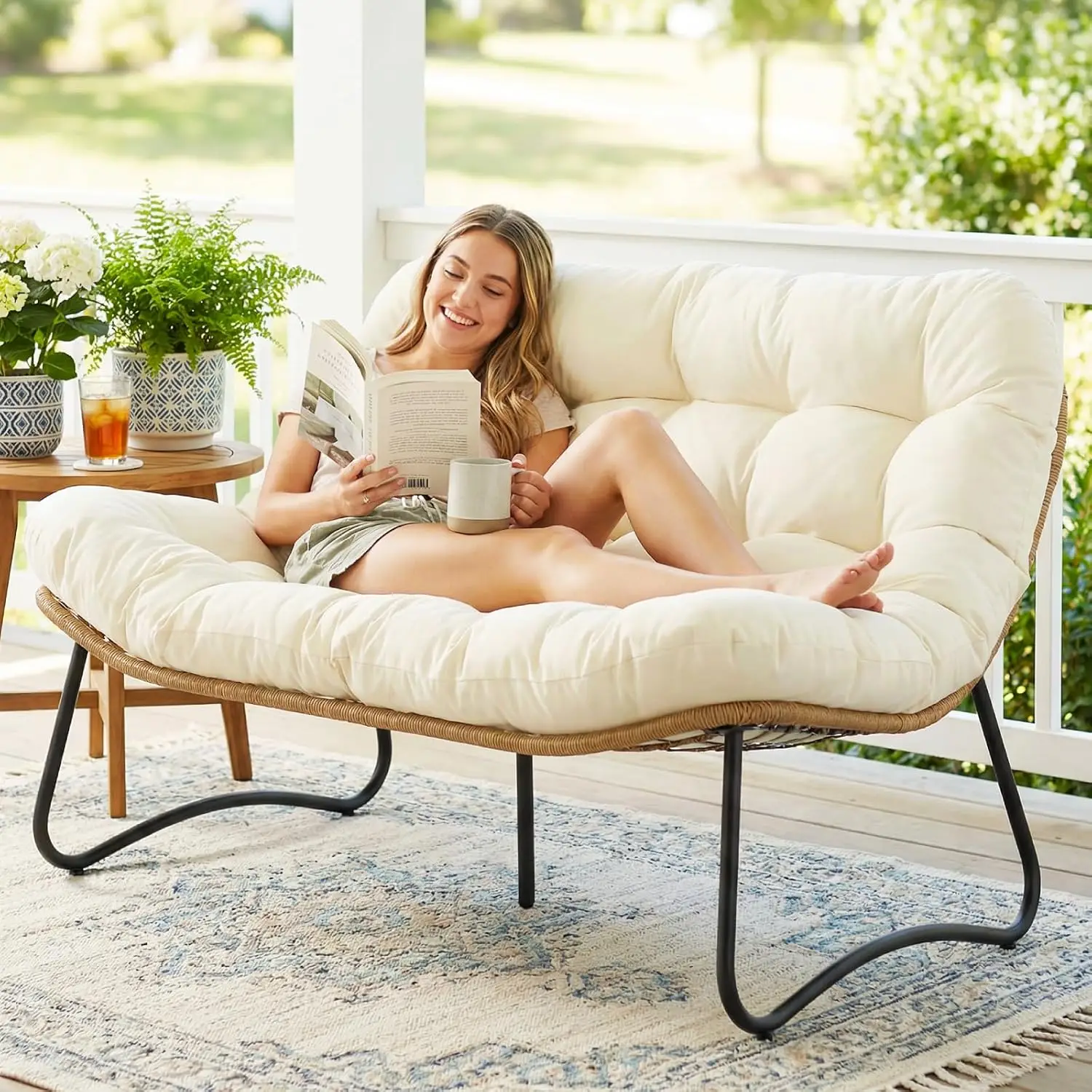 Nordic Wicker Double Papasan Patio Loveseat in outdoor patio environment