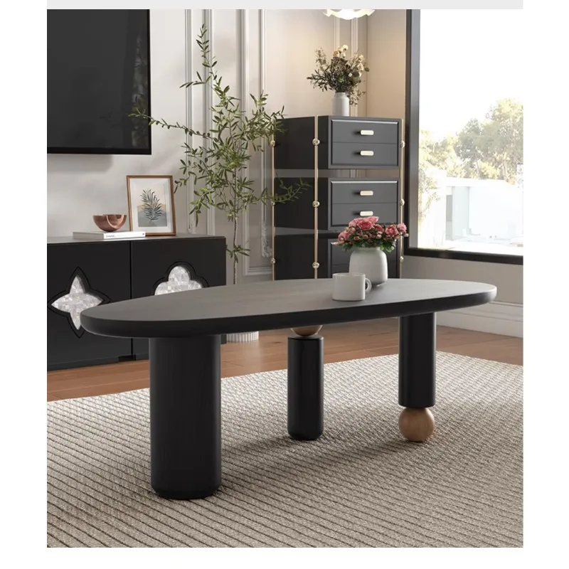 

Medieval style solid wood special-shaped coffee table, small apartment living room black tea table wabi-**** style design sense