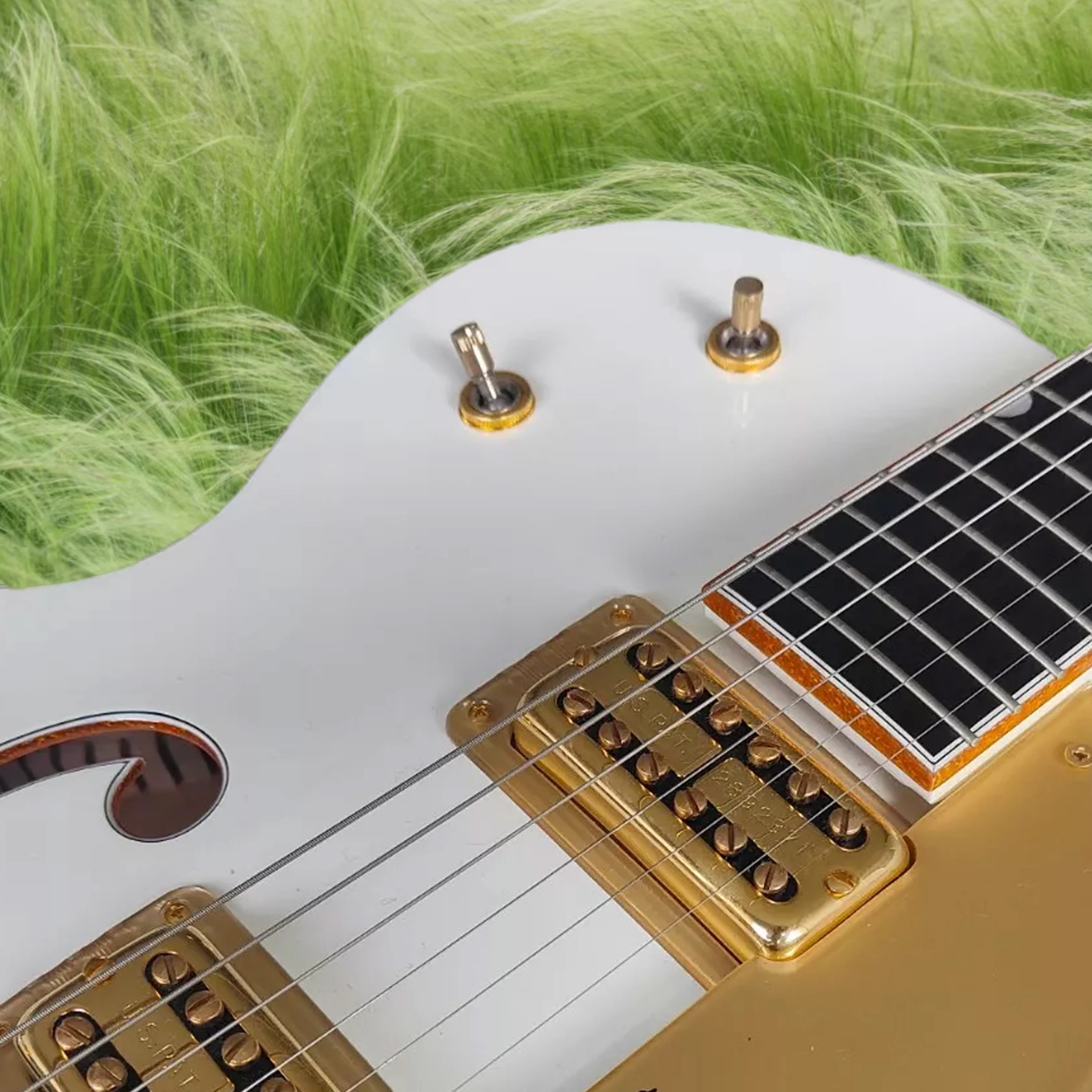 Customized White Electric Guitar Gold Sparkle Body Binding Hollow Body Double Hole Bigs Tremolo Bridge Gold Hardware