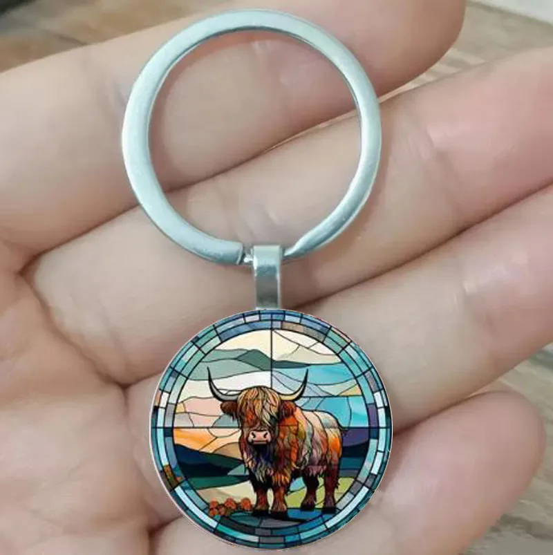 Highland cows sunbathing men's colorful cow keychain, backpack retro pendant, holiday gift