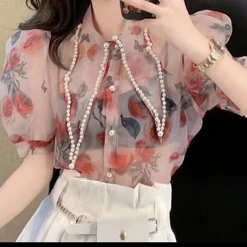 Shirt women's new niche design in the summer of 2024 printed large pointed collar heavy industry beaded short-sleeved shirt