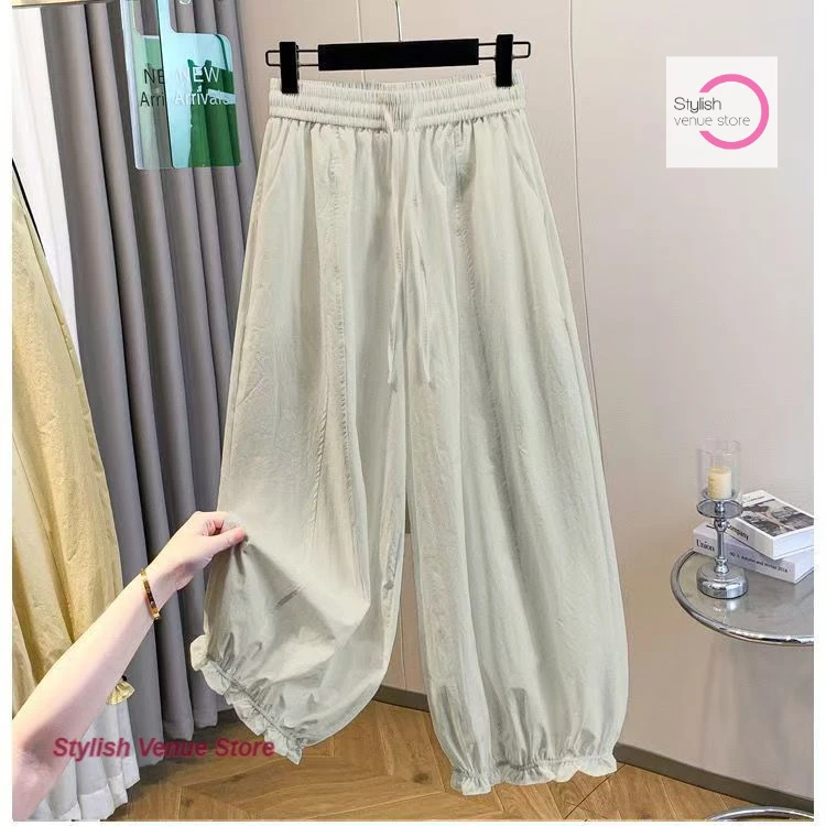 

Korean style navy ice silk quick-drying pants women's summer thin fashion high waist loose toe bud bloomers casual pants.