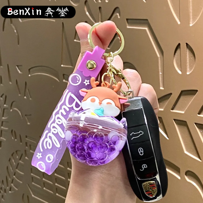 2025年ミンソオイル入りサンドボトル、小動物キーホルダー、スクールバッグペンダント、可愛いカップル、車キーホルダー、ペンダントとギフト