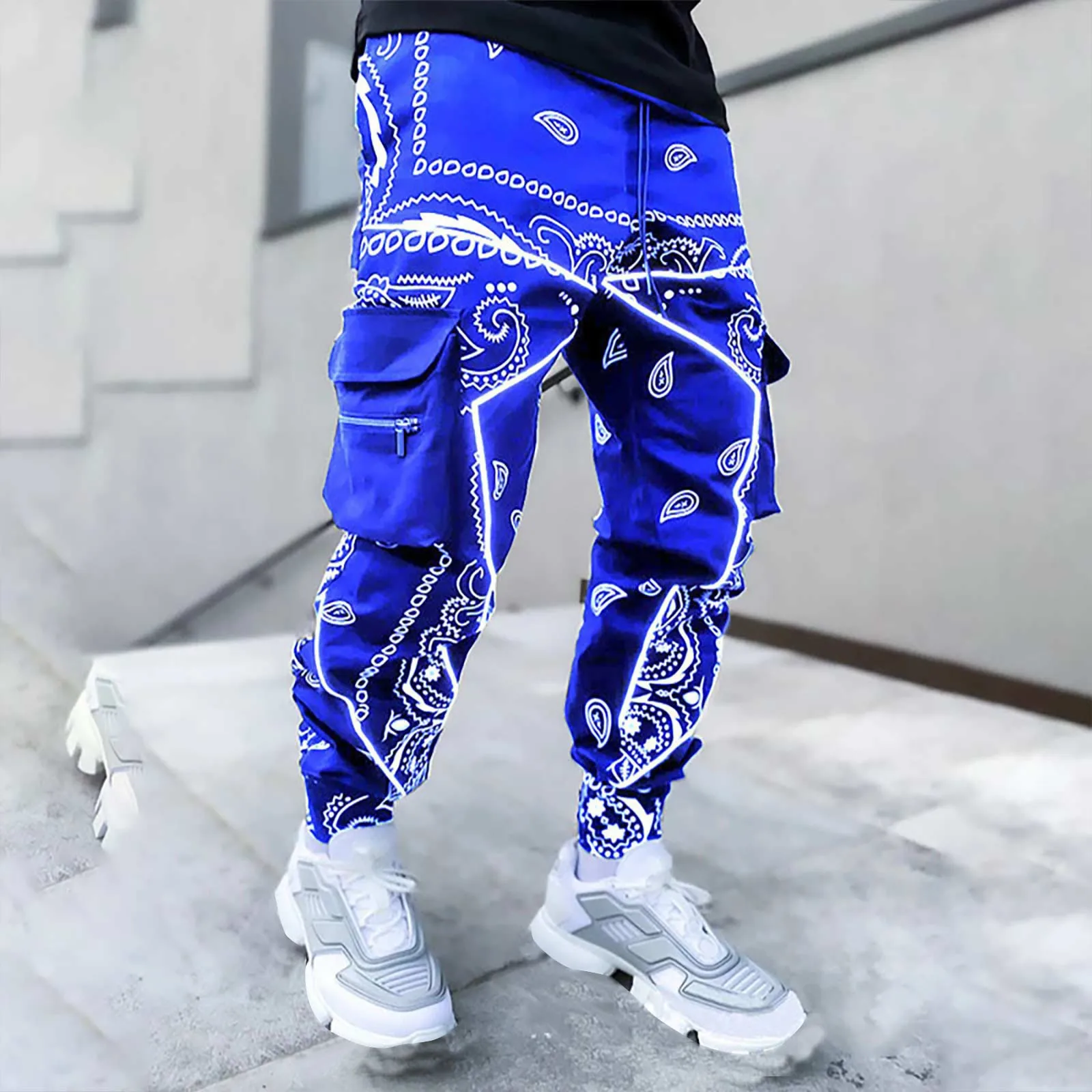 

2023 Men's Printed Cashew Flower Haren Pants All Seasons Loose High Street Small Feet Multi Glitter Moccasins Women Pants Men