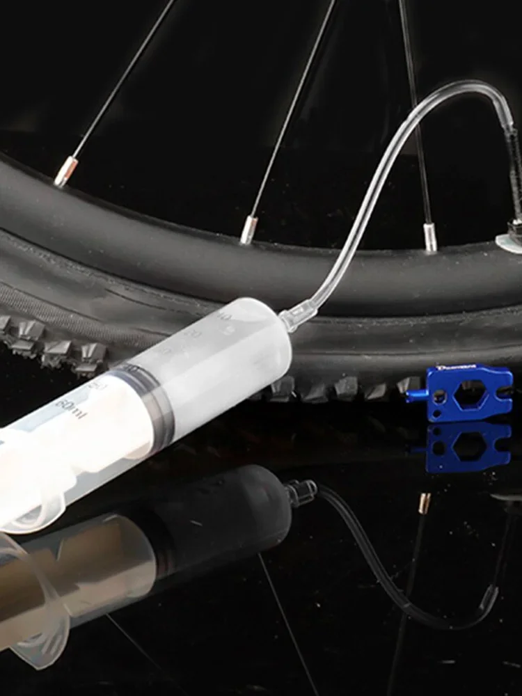 AliExpress Bicycle Tubeless Tire Liquid Injection Tool 60ml Tire Tubeless Sealant Injector Oil Mineral Change Tool for Bike Repair Tools