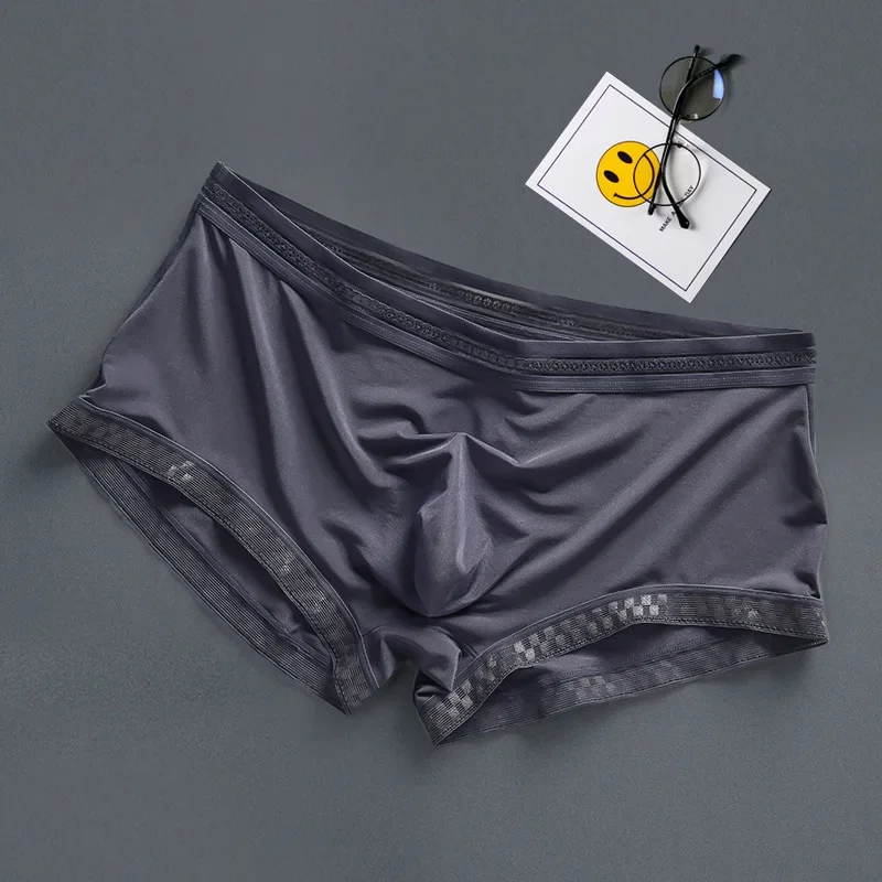 Boxers para hombre, ropa interior de seda helada, Boxer fresco de verano, bolsa 3d transpirable, pantalones cortos con flechas, calzoncillos transparentes de moda para hombre