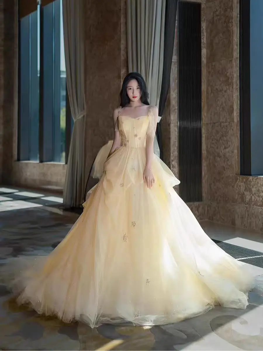 فساتين زفاف طويلة فاخرة باللون الأصفر للنساء مزينة بالتول صور فساتين زفاف على شكل قلب للحفلات المسائية والحفلات الراقصة