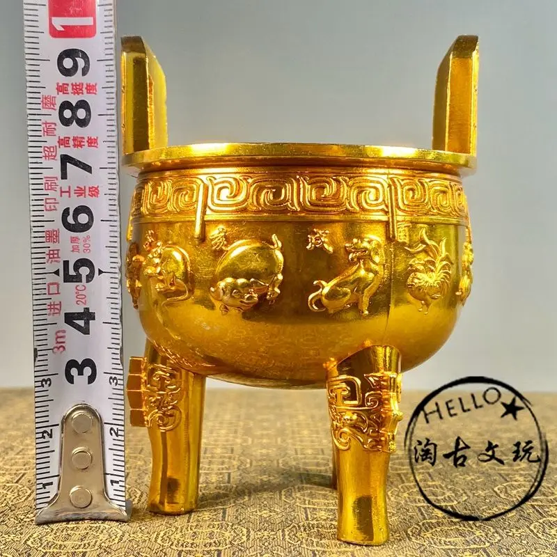 Tang Zhenguan annual made binaural three-legged zodiac solid gilt copper tripod ancient incense burner