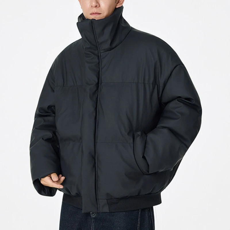 2025 Abrigo de algodón de color sólido corto y grueso cálido de invierno para hombre, chaqueta holgada informal a prueba de viento con cuello levantado.