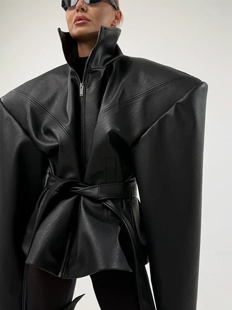 Faux Leather Women's Jacket With Belt Stand Collar Zipper Pocket Oversized Wide Shoulder Female Fashion Coat High Street Outdoor