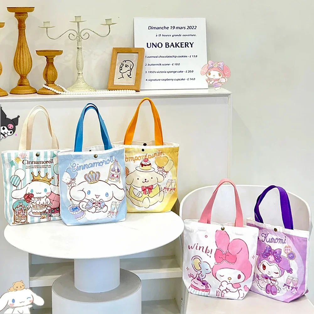 Sanrio กระเป๋าผ้าแคนวาสลาย My Melody กระเป๋ากระเป๋าสะพายไหล่ Cinnamoroll อนิเมะ Kuromi กระเป๋าถือช้อปปิ้งความจุสูงกระเป๋าเก็บการ์ตูนของขวัญเด็กผู้หญิง