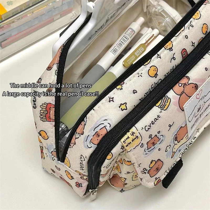 Estuches para lápices con tapa de capibara, estuche para lápices de dibujos animados a la moda, bolsa de almacenamiento de papelería Kawaii, bolsas de cosméticos, monedero