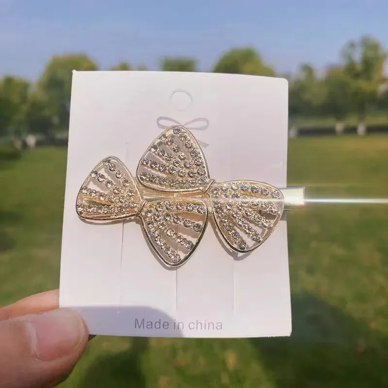 Broche con forma de lazo y diamantes de imitación para mujer y niña, accesorios de traje exquisitos, joyería elegante, regalo de fiesta, venta al por mayor, 2024