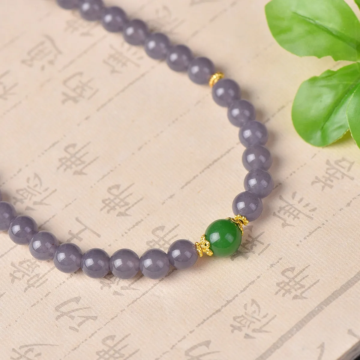 

This exquisite golden thread jade smoke purple round bead bracelet symbolizes completeness and is a perfect gift for your family