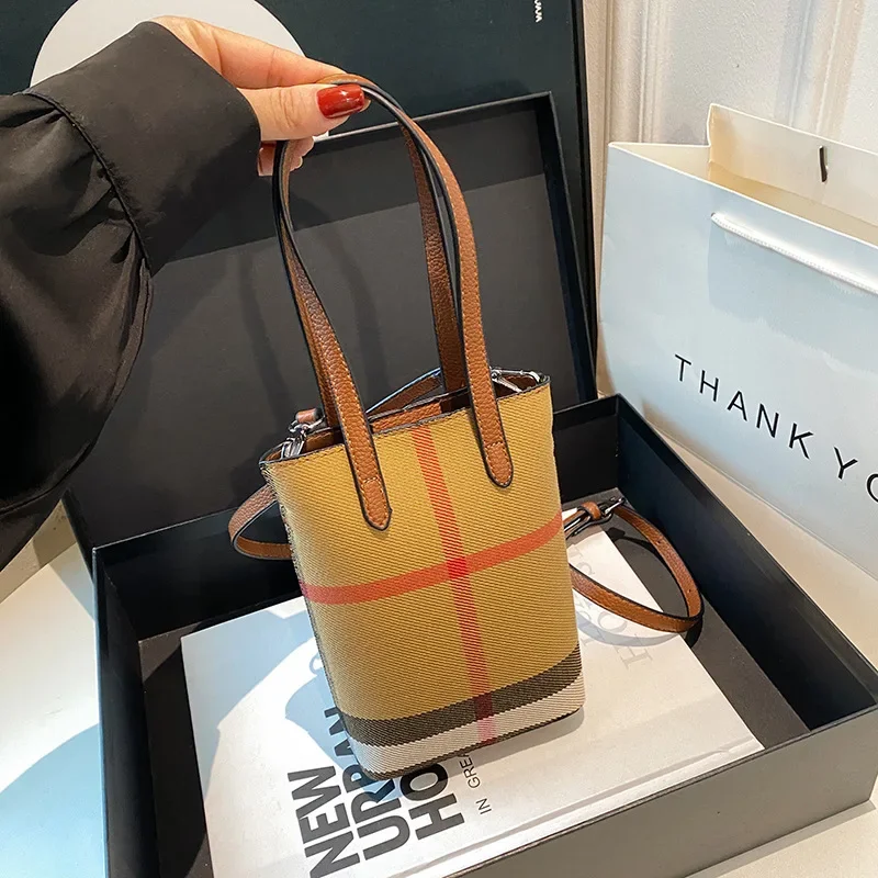 Bolso tipo cubo tipo bandolera con bloques de Color a la moda para mujer, bolso de mano con diseño elegante, sensación de gama alta, nueva gran oferta de temporada