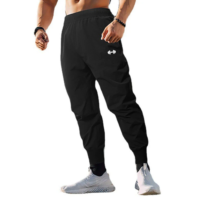 Palestra Bodybuilding Fitness pantaloni sportivi da uomo pantaloni da allenamento Casual vita elastica pantaloni lunghi larghi a vita alta ultrasottili ad asciugatura rapida