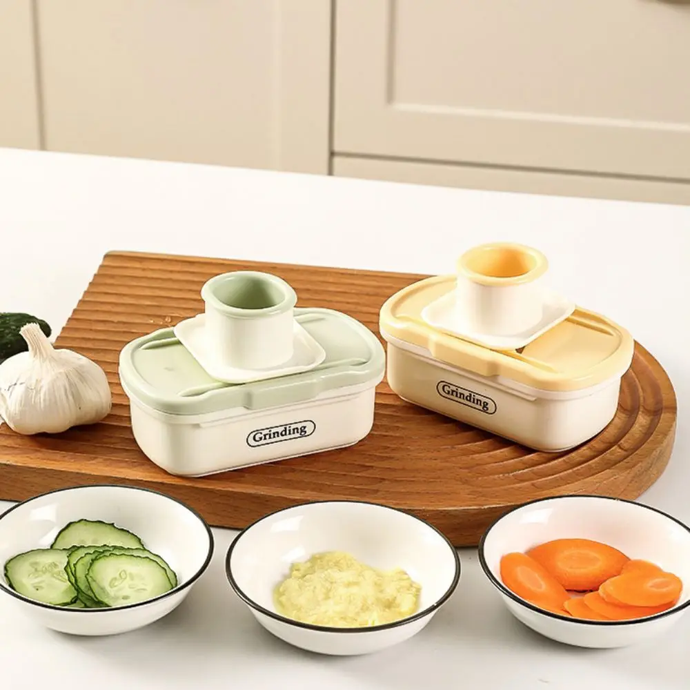

Multifunctional Manual Garlic Grinder 2 in 1 Plastic Garlic Smasher Mini with Hand Guard Garlic Planer Baby Complementary Food