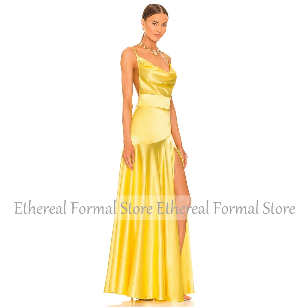 モダンなイエローの女性のイブニングドレススパゲッティストラップマーメイドイブニングドレス結婚式用ノースリーブスリットロングフォーマルパーティードレス