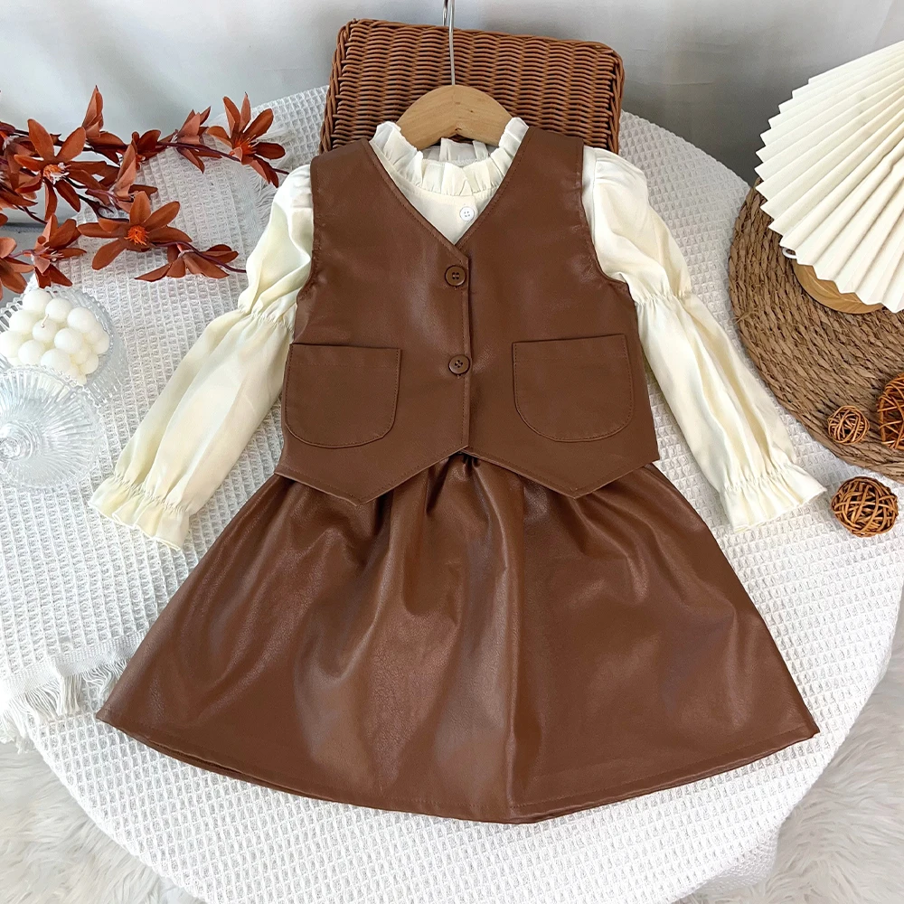 Korean Version Coffee Colored Leather Vest+lantern Sleeve Base Shirt+short Skirt Three Piece Set for Girls Aged 3-7 in Autumn