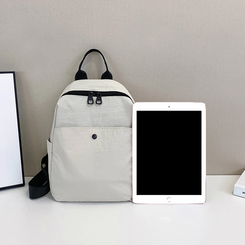 กระเป๋าเป้ไนลอนเกาหลีสำหรับผู้หญิง สีพื้นเรียบง่าย กระเป๋าเป้สะพายหลังขนาดเล็กสำหรับนักเรียนวัยรุ่น กระเป๋าเดินทาง กระเป๋าเป้สำหรับคุณแม่