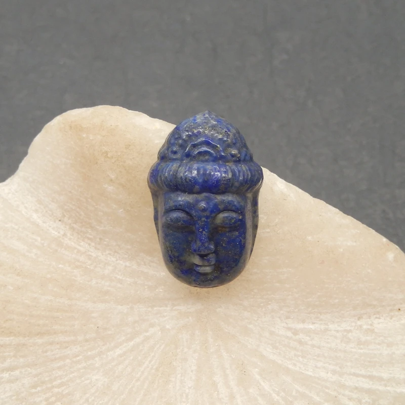 

Natural Lapis Lazuli Deep Blue Gemstone Carved Buddha Head Component with Pyrite Inclusions for Handmade Jewelry And Artisanal