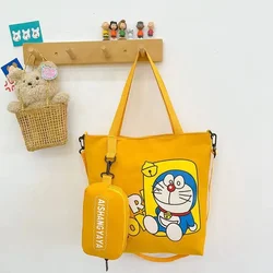 Doraemon-monederos y bolsos de mano Kawaii para mujer, bolso cruzado de un solo hombro, monedero bonito