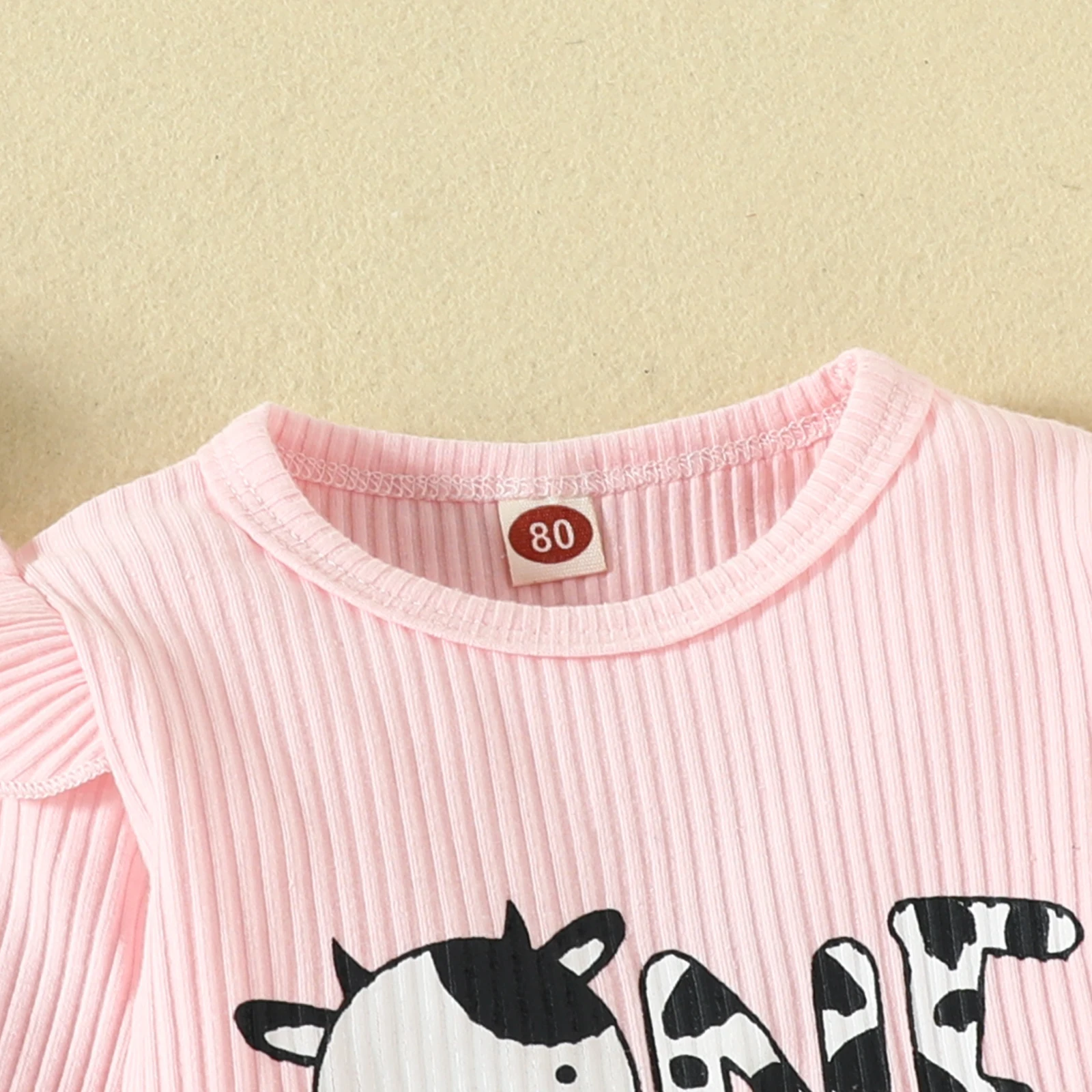 Three-piece baby girl cartoon cow print small flying sleeve long sleeve top halter wrap fart triangle pants three-piece set