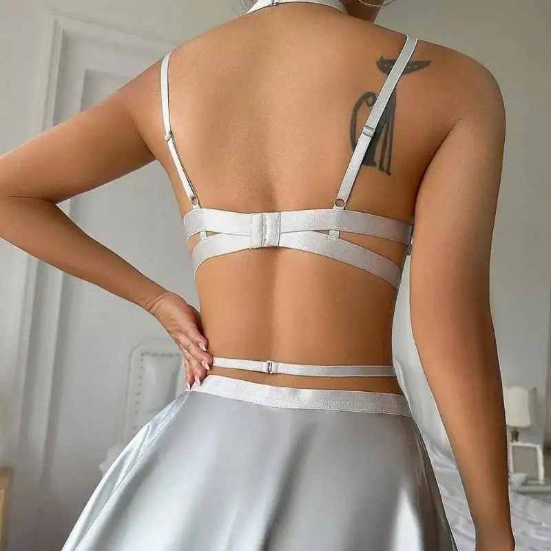 ชุดชั้นในเซ็กซี่ชุด 4 ชิ้นผู้หญิง Halter ชุดชั้นใน Fishnet ขาถุงเท้าหนัง Bra กระโปรงแหวนโลหะไนท์คลับ