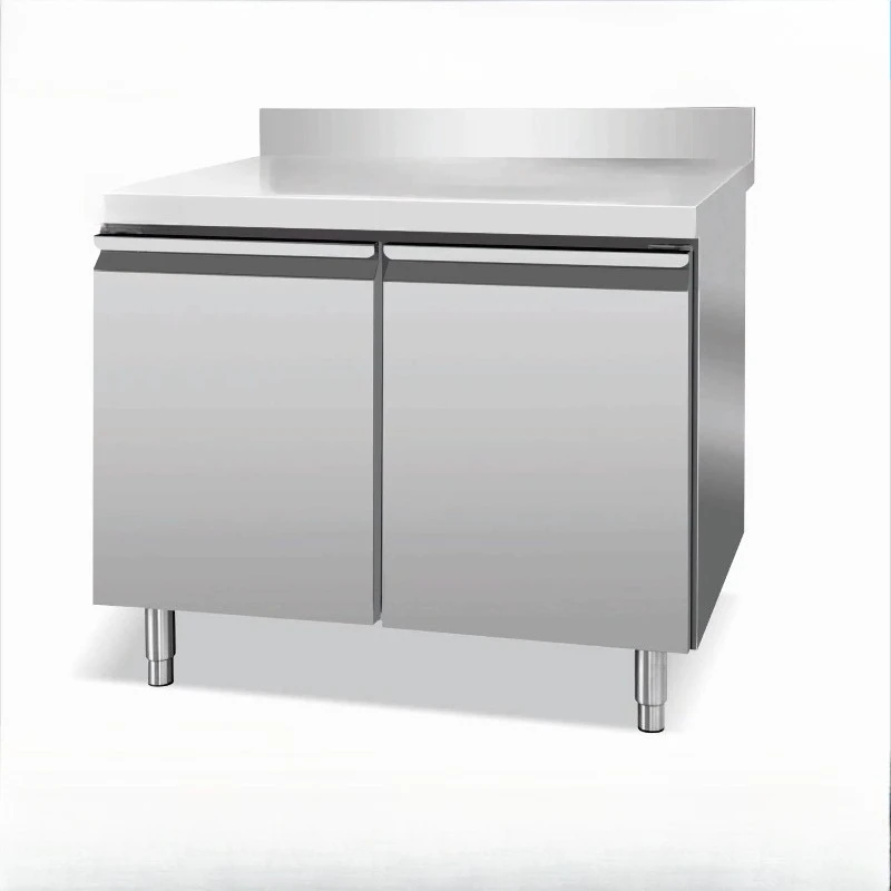Sturdy stainless steel workbench with cabinet and wheels, suitable for commercial kitchens