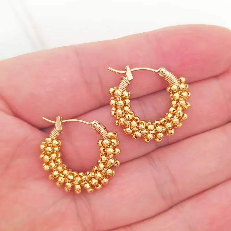 Beaded earrings Circle Originality Golden Entangle Geometry Hand knitting Bohemia Alloy Crystal Tide Simple Rice bead earrings