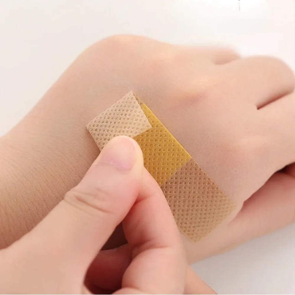 50 pçs à prova dwaterproof água curativo remendos fita auto-adesivo gesso bandagem tecidos não tecidos band aid para crianças