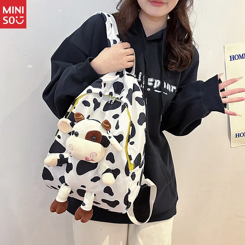 

Miniso Preppy Cow Plush Backpack, Cute & Spacious Cartoon Bookbag for Girls, Kawaii School Bag