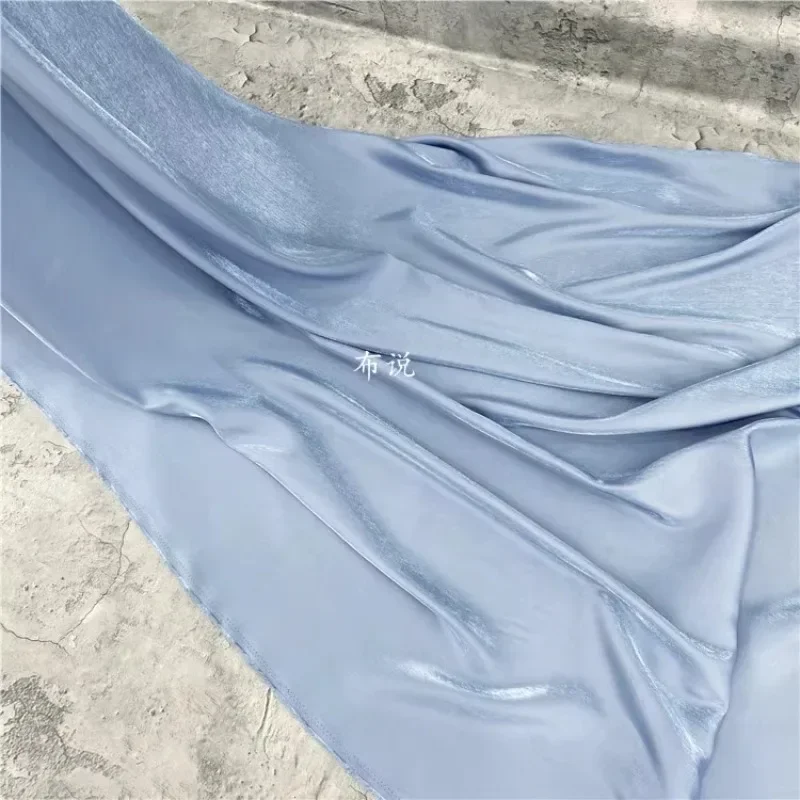 

Glazed Satin Fabric Water Blue Glossy Silk Smooth Skirt Shirt Wholesale Cloth for Diy Apparel Sewing Meters Material