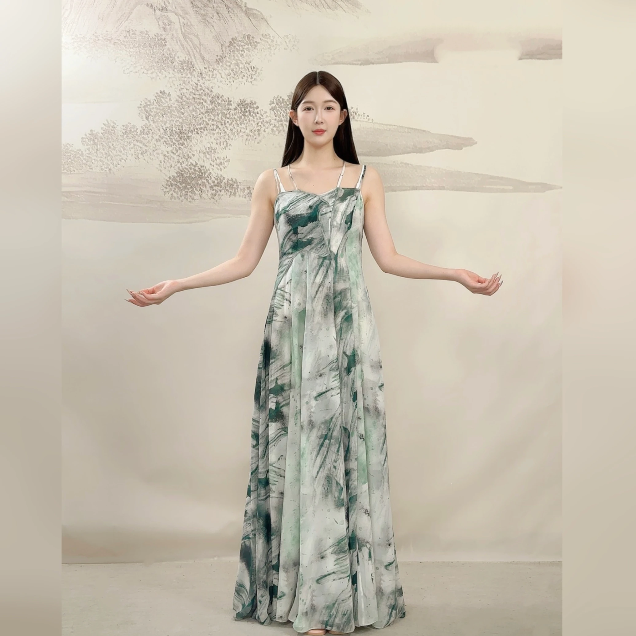 

Georgette silk style floor-length strappy evening dress with a flared skirt, featuring a delicate and flowing design