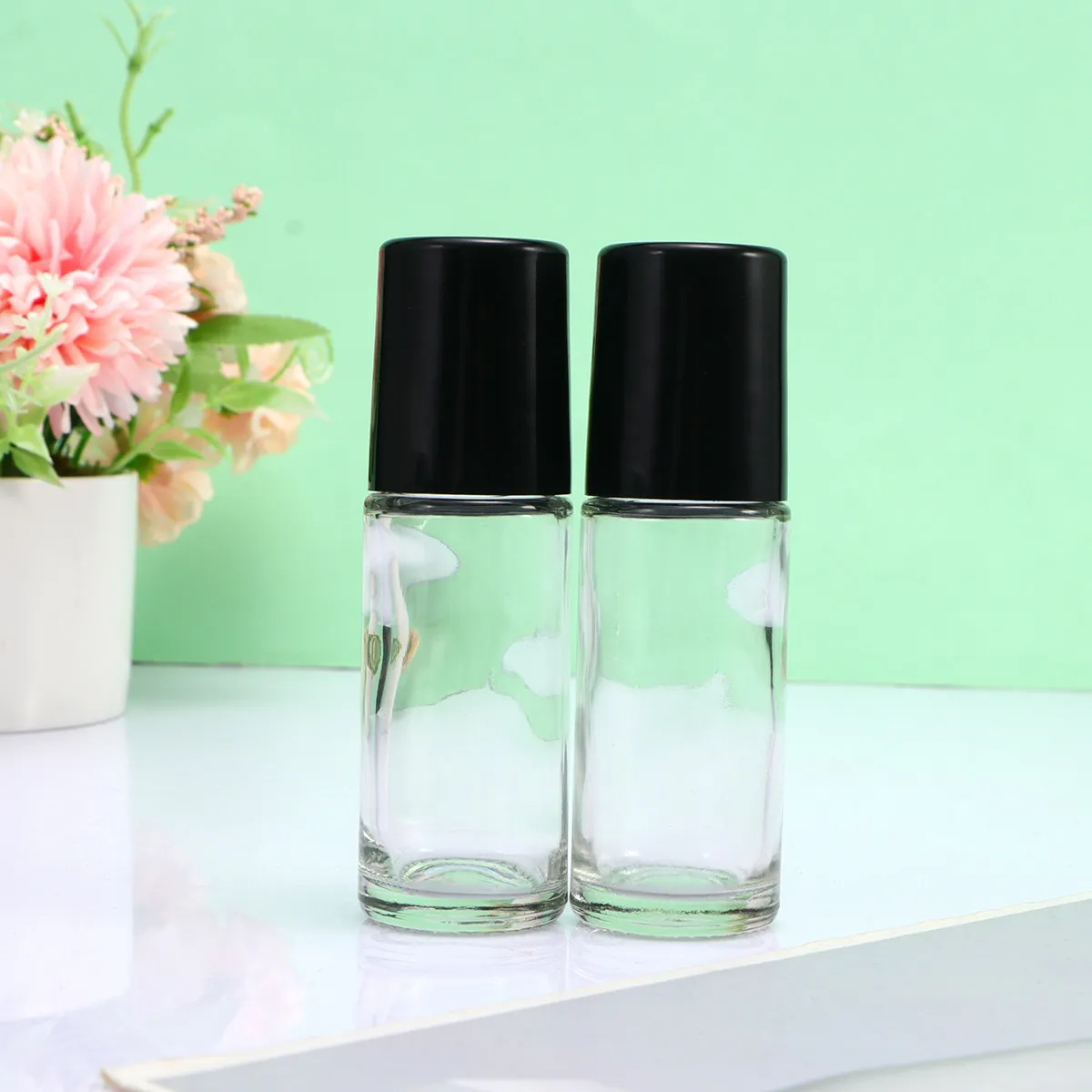 4Pcs Essential Oil Roller Bottles 30Ml Leakproof Portable Empty Refillable Subpackaging Bottles for Travel and Home Use Black