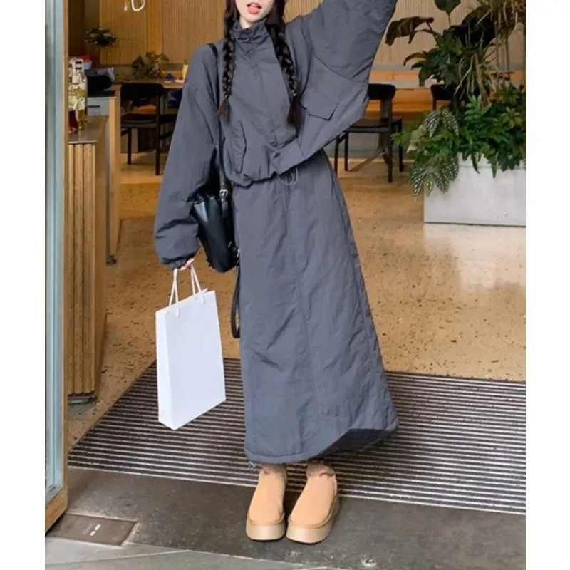 

Women's 2025 Winter Fashion Set: Quilted Thickened Warm Stand-Collar Workwear Long-Sleeve Cotton Coat and High-Waist Midi Skirt