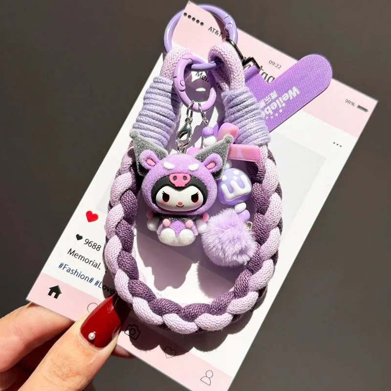 

Official Sanrio Kuromi Phone Lanyard Cute Braided Wrist Strap with Doll Charm Keychain Anti-Lost Phone Wristlet for Girls Fans