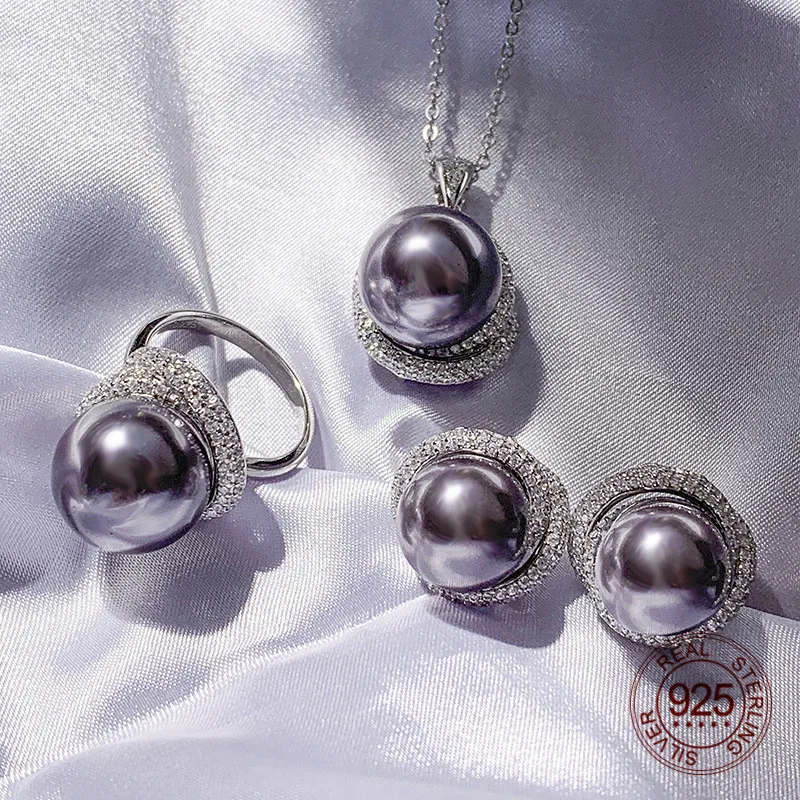 

Комплект из колье, серёг и кольца, из серебра 925 пробы