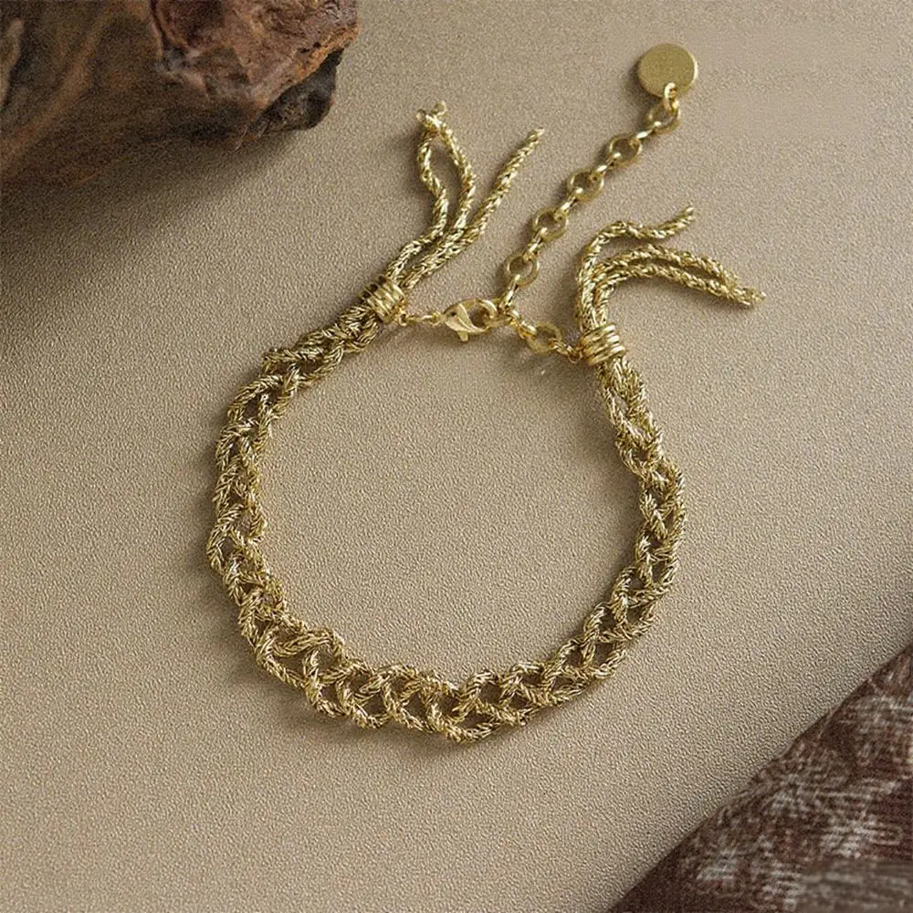 

2025 New Europe Fashion Brass Plated 18K Gold Retro Weaving Knotting Bracelet Women Party Jewelry Trendy