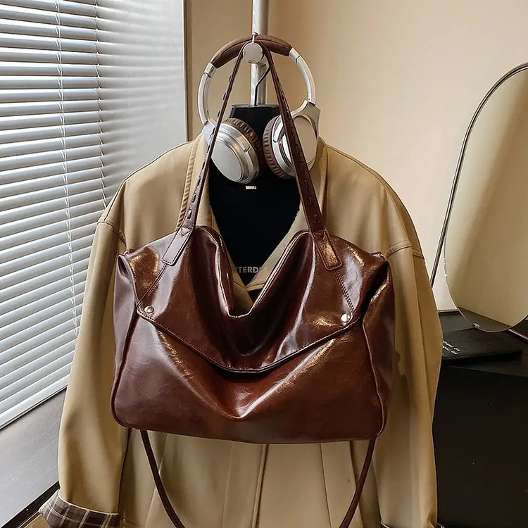 

2026 New Korean Large-capacity Solid Color Women's Fashion Commuter Bag Texture Personalized Shoulder Bag Tote Bag