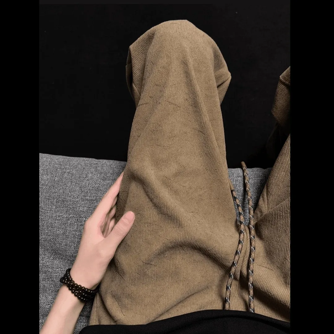 Pantalones escimitar diagonales con patrón oscuro de color caqui, pantalones de chándal de pana retro americanos de otoño para hombre, pantalones deportivos informales drapeados